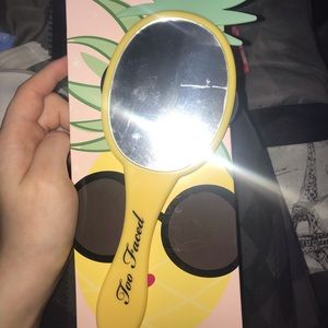 Too Faced pineapple beauty mirror .